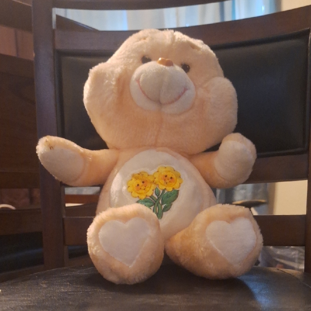 Cute Tan Teddy Bear with Heart and Flower Design